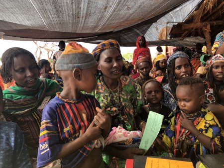 Mothers and children in Mingala, an area that is difficult to access due to insecurity and bad road conditions, during a two-day MSF vaccination programme. Central African Republic, March 2019.