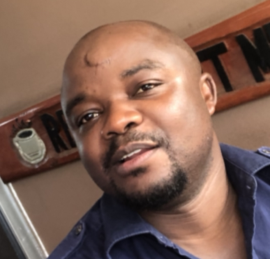 A portrait of Dr. Alain Kikwaya-Vangi