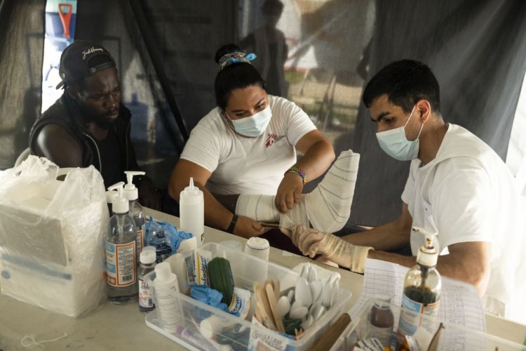 Julien Jean  Haiti seriously injured his leg while crossing the jungle. My colleague Maria Lucero and I attended to him at the immigration reception centre. Unfortunately, we were unable to provide him with a proper crutch - the one he is using is too sma