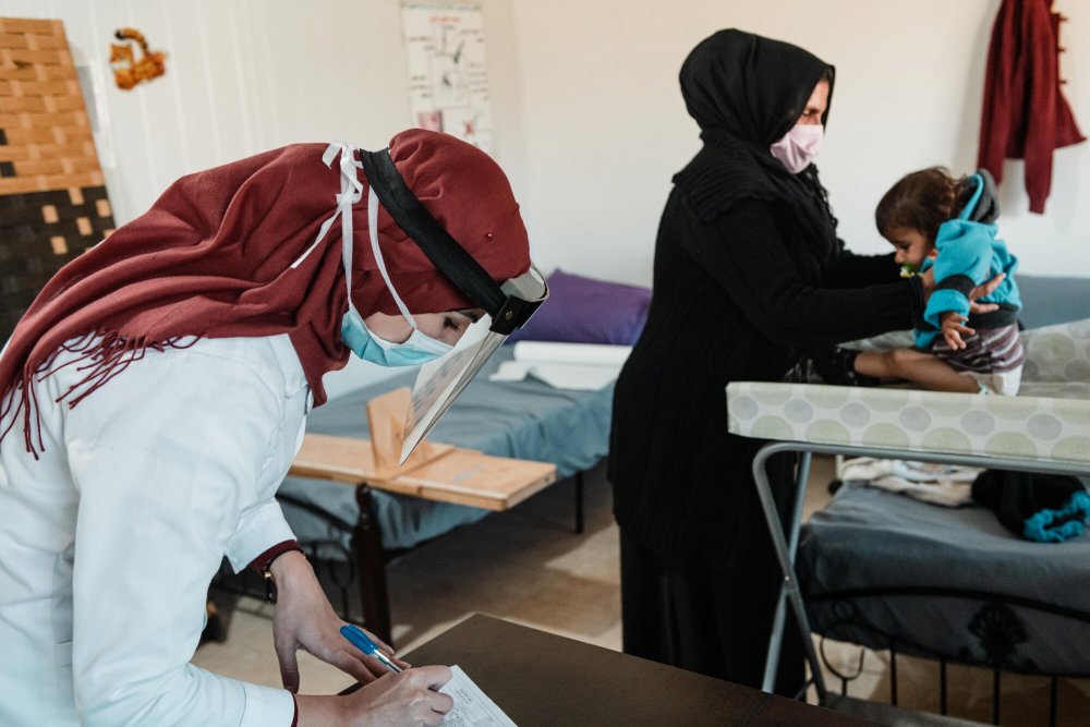 A mother and her child during a consultation in MSF&#039;s clinic in Hermel - where we offer medical care for patients with NCD&#039;s, acute paediatric consultations, sexual and reproductive health services and mental health support. 