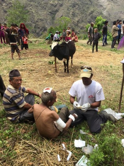 Assisting injured people in Marbu village, Nepal