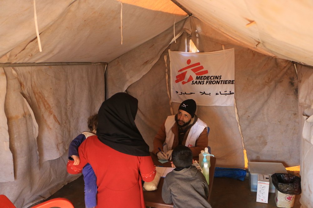 A MSF nurse is registering patient at the mobile clinic setted up in Al-Fuqara camp, Al-Dana area.