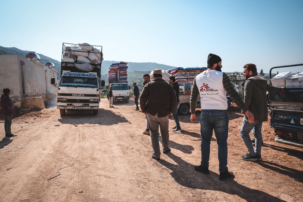 MSF distributes relief items to a reception center hosting displaced families
