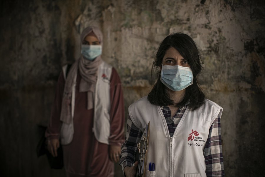 Dayana Tabbarah, MSF health promoter, and Hala Hussein, MSF nurse, visit houses of patients who have agreed to participate in a shielding project in the Burj al-Barajneh refugee camp in Beirut, Lebanon.