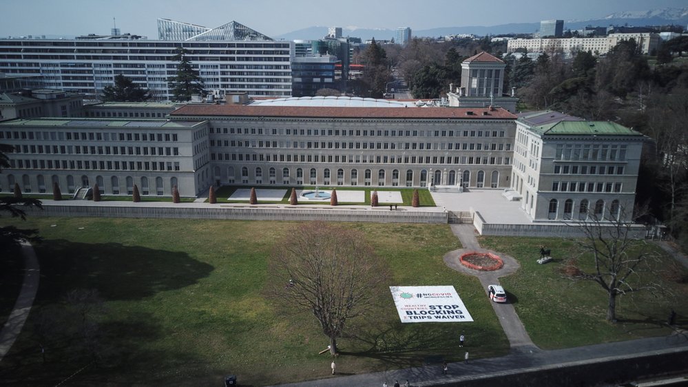 Aerial view of the banner deployed by MSF in front of the World Trade Organization (WTO) in Geneva calling on certain governments to stop blocking the landmark waiver proposal on intellectual property. (March, 2021).