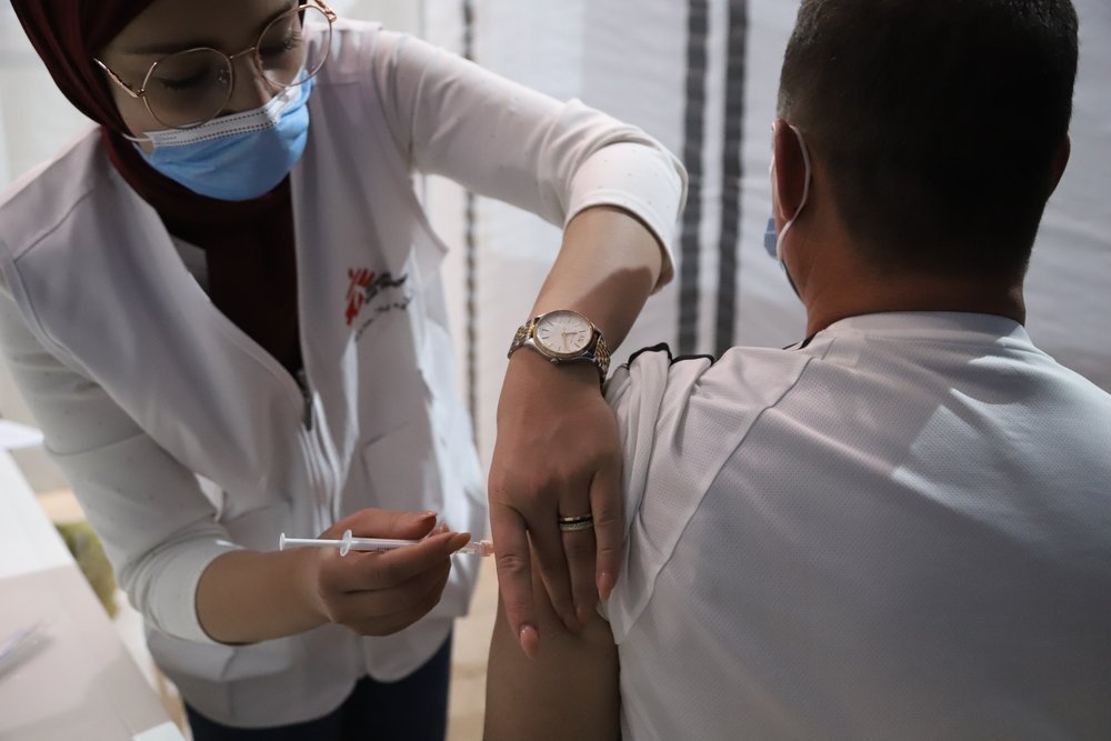 A man receives a dose of COVID-19 vaccine at the MSF vaccination center in Bar Elias (Bekaa Valley). (June, 2021).
