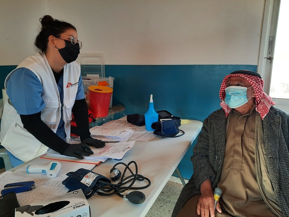 MSF mobile clinic doctor treating patient in Palestine