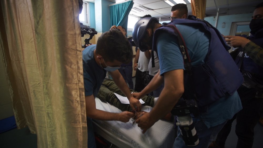 Palestinian receives medical services after being injured. Intensive bombing on Gaza - May 2021.