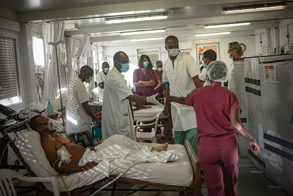 Intensive Care Unit of Tabarre’s hospital in Port-au-Prince, Haiti. Every morning the medical team of the hospital makes its morning rounds, as the overnight team hands over care of the patients.