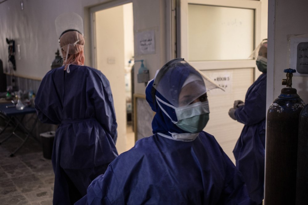 Nurses are busy in the corridors of the COVID-19 section of Raqqa National Hospital, in northeast Syria.  (June, 2021).