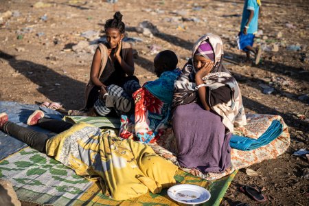 This crowd walked miles from neighbooring Ethiopia to reach Sudan  to escape the conflict in their region.