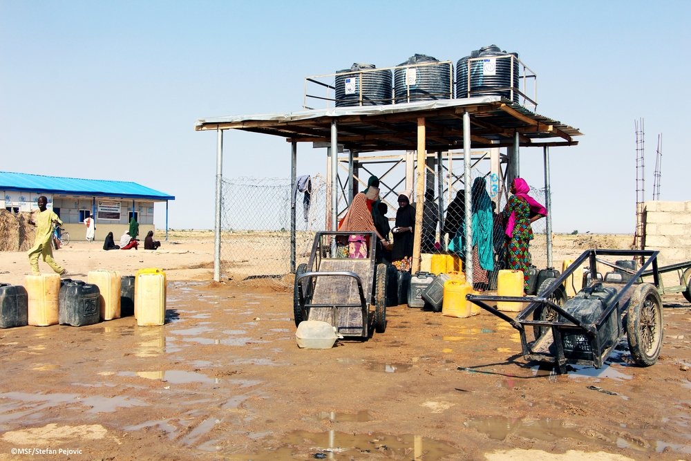 &quot;Those of us with four or five jerry cans are usually asked to wait for the pushcart owners from the community to get water before we can get water,&quot; explains Maryam, a camp resident. 