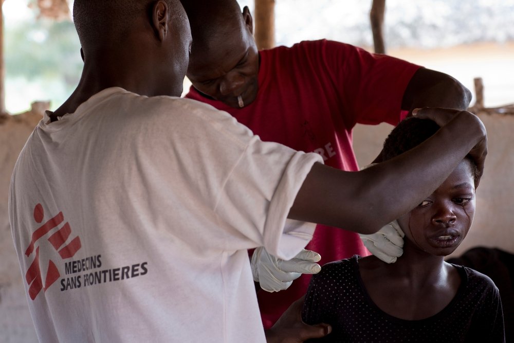 MSF mobile clinic staff runs tests to diagnose sleeping sickness in the village of Emmaus, northeast DRC.