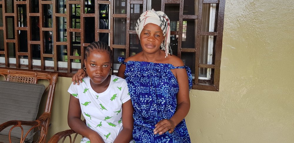 Blessing Jelleh, shown at home with her mother Solange Jelleh, is receiving treatment for epilepsy through an MSF-supported health facility in Montserrado County, Liberia. (February, 2022).