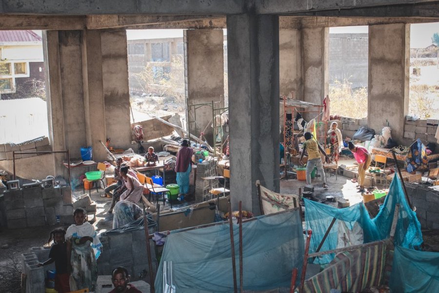 Hundreds of people in Shire’s University IDP site live in an unfinished building, where they sleep, cook and eat. Many don’t have mattresses or blankets.