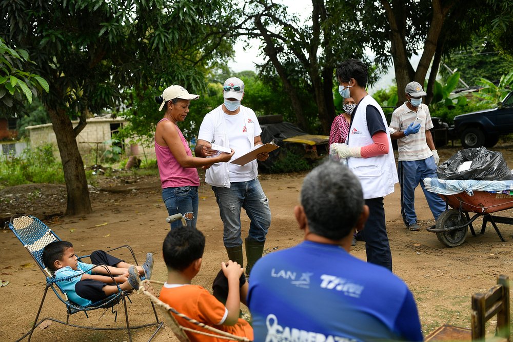 José Prado, his wife Yeneida and their two sons, Fernando and Jorge, welcome MSF teams into their home during a health fair in the community of Desparramadero, Anzoátegui state.