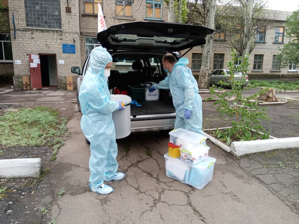 MSF mobile team prepares to collect samples of healthcare workers at Krasnohorivka hospital, in Eastern Ukraine, to test for COVID-19.