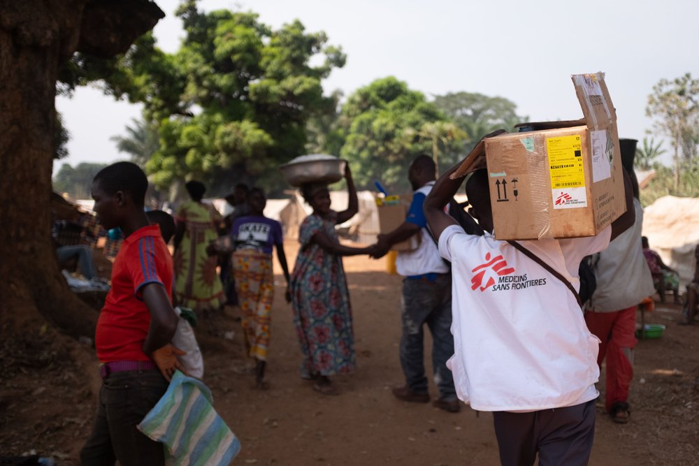 An MSF staff is transporting medicines  to the Bondeko Health Center in Ndu, northern DRC, where thousands of people from CAR sought refuge due to a non-state armed group attack on Bangassou on January 3rd 2021. 