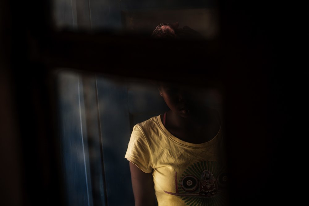 M., victim of sexual violence (HIV-infected), 13/15 years-old. 