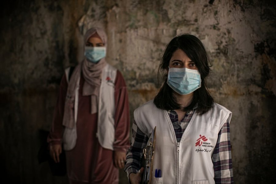 Dayana Tabbarah, MSF health promoter, and Hala Hussein, MSF nurse, visit houses of patients who have agreed to participate in a shielding project in the Burj al-Barajneh refugee camp in Beirut, Lebanon.