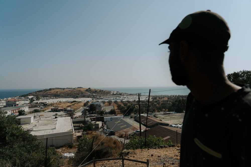 “I have been in Lesvos for 1 year and a half. If there was no war in Syria, I would have never left my country. I left because of the war. I have been held in prison there and I have been beaten so hard, that now I have a blood clot in my head.&quot;