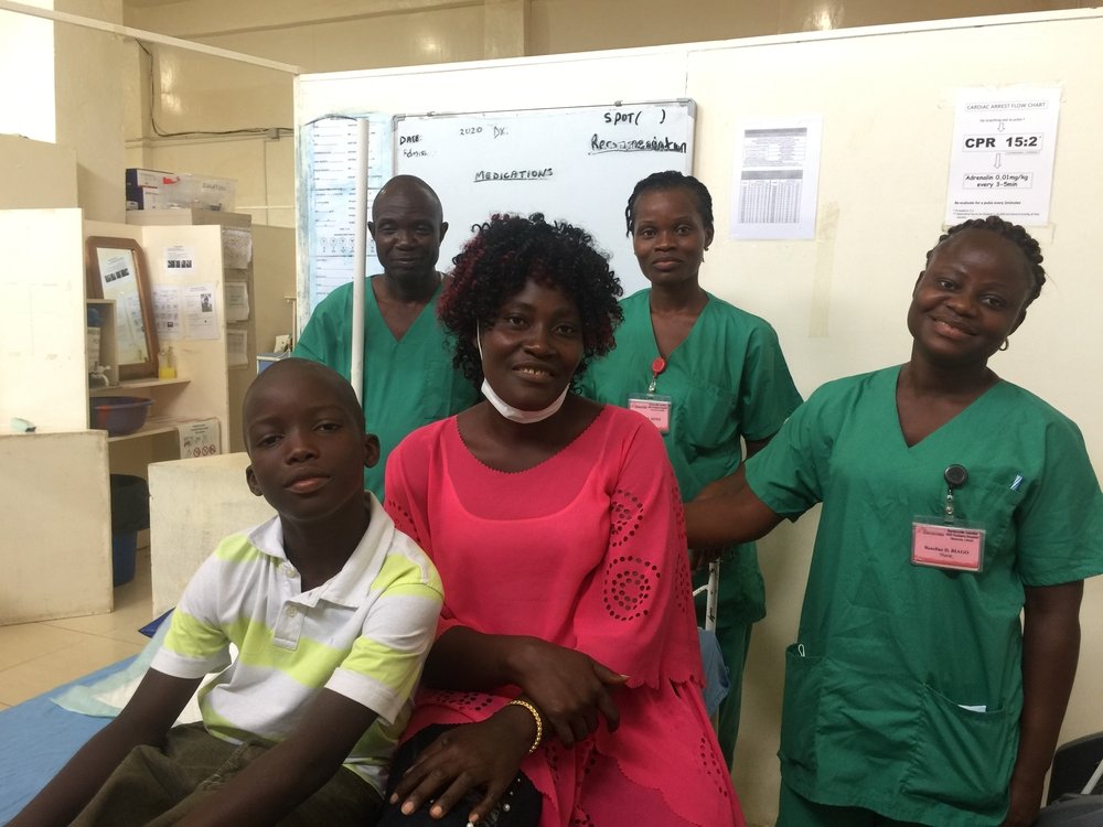Paul B. Morris Jnr and his mother Lydia reunited with physician assistant George and nurses Jolena and Roseline, some of the staff who cared for him in the MSF Children’s Hospital, Monrovia, when he was critically ill with cerebral malaria. November 2020