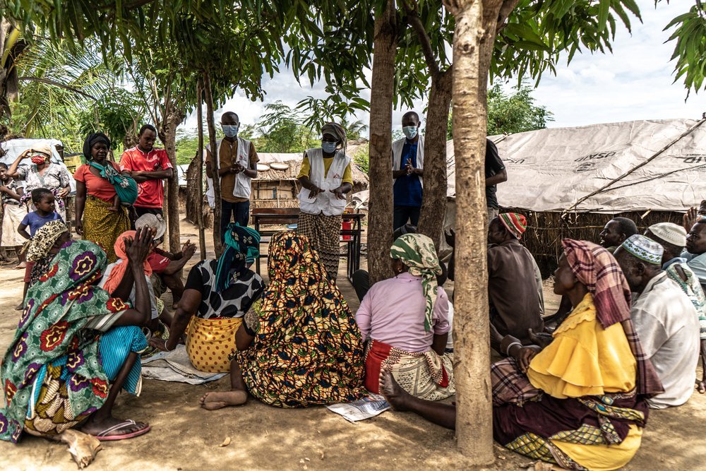 A mental health session is conducted with people who have sought shelter in the Nangua camp for internally displaced people. These sessions are used to help those displaced by the armed conflict in Cabo Delgado talk about their experiences. 