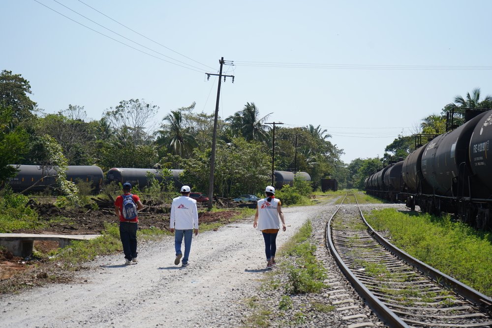 MSF staff walk on tracks at the Higueras station looking for migrants who require medical, psychological and social work attention. In that area they are often victims of extortion by the guards and suffer violence at the hands of criminal groups at night