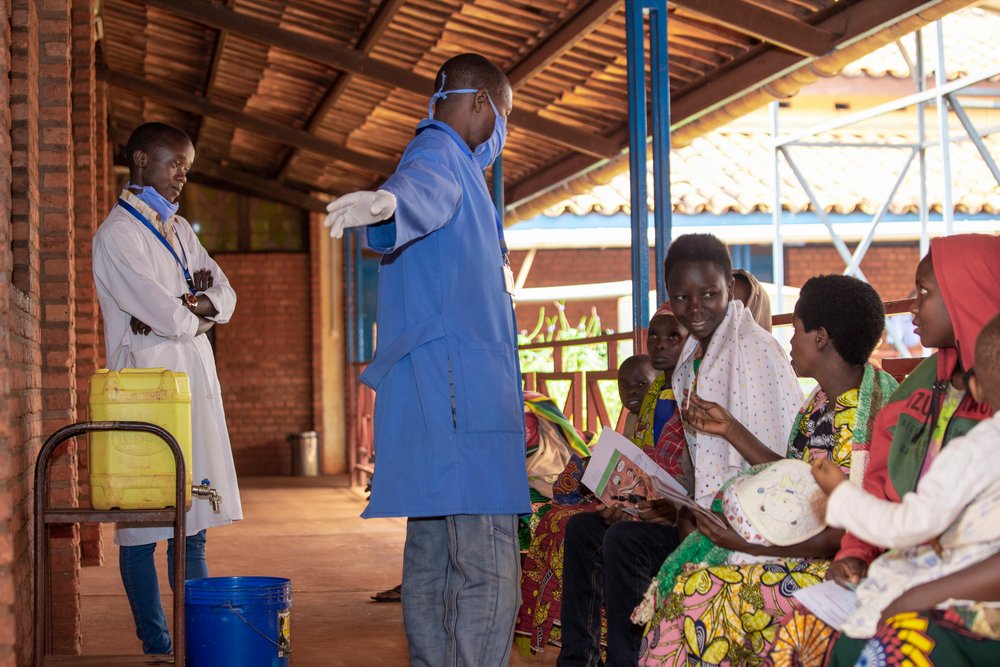Patients are waiting for a malaria consultation at the MSF-supported Kinyinya district hospital.