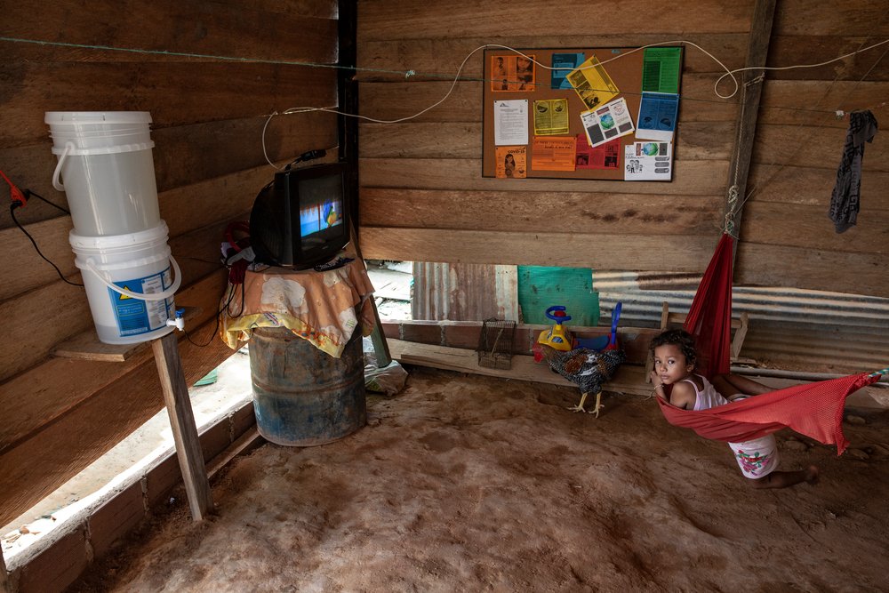 Interior of a makeshift house in La Gabarra, Colombia. Three of the five most common diseases in the settlement originate from the use and consumption of unsafe water. 
