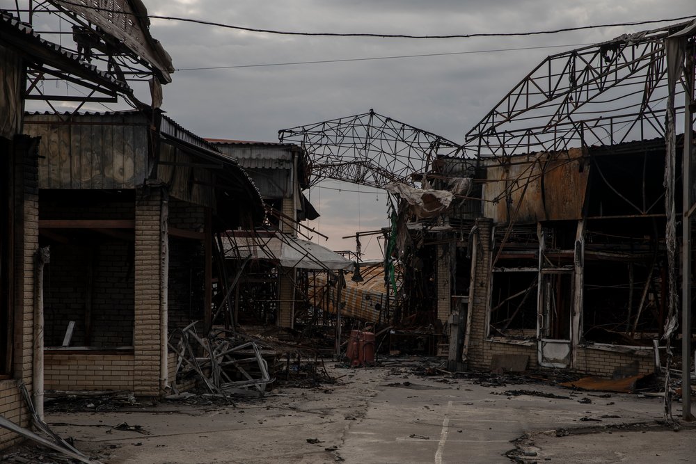 A market destroyed by a fire caused by bombing in Kharkiv, Ukraine. (April, 2022).