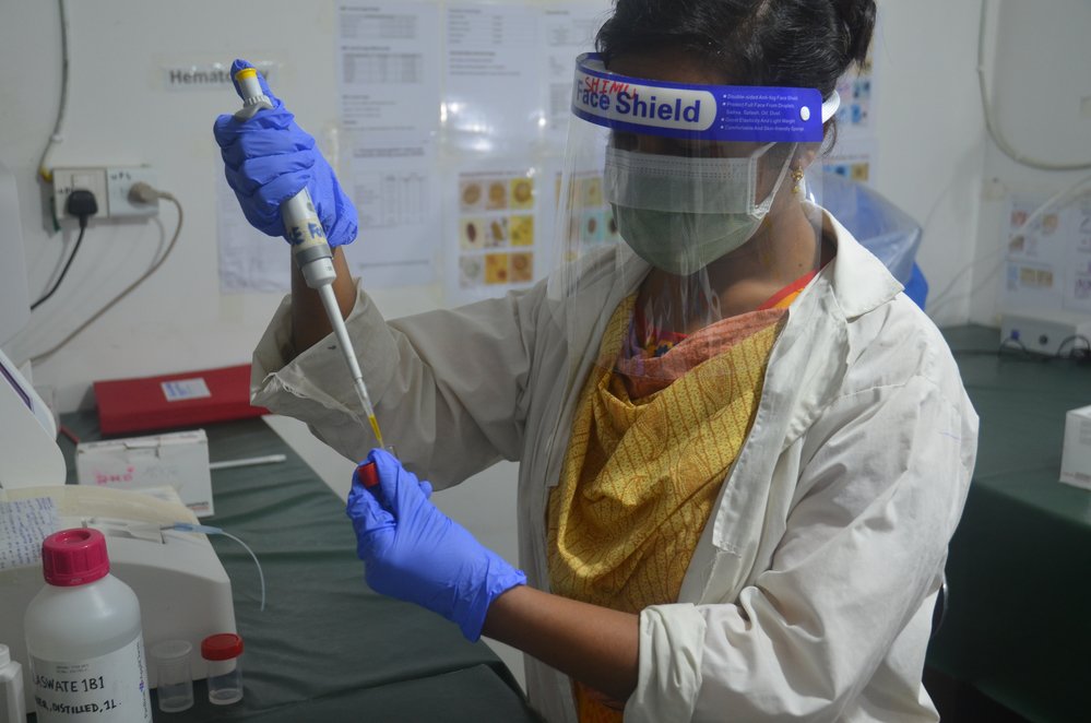 Lab technician Shimu Baidya at work in MSF’s laboratory at Goyalmara mother and child hospital in Cox’s Bazar, Bangladesh.