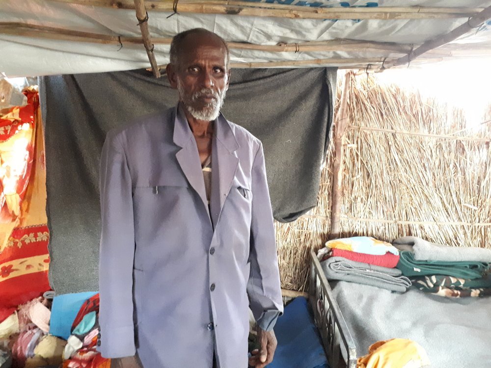 Hider, an Ethiopian refugee in Sudan for the third time in his life who has been separated from his son after arriving in Hamadyet.