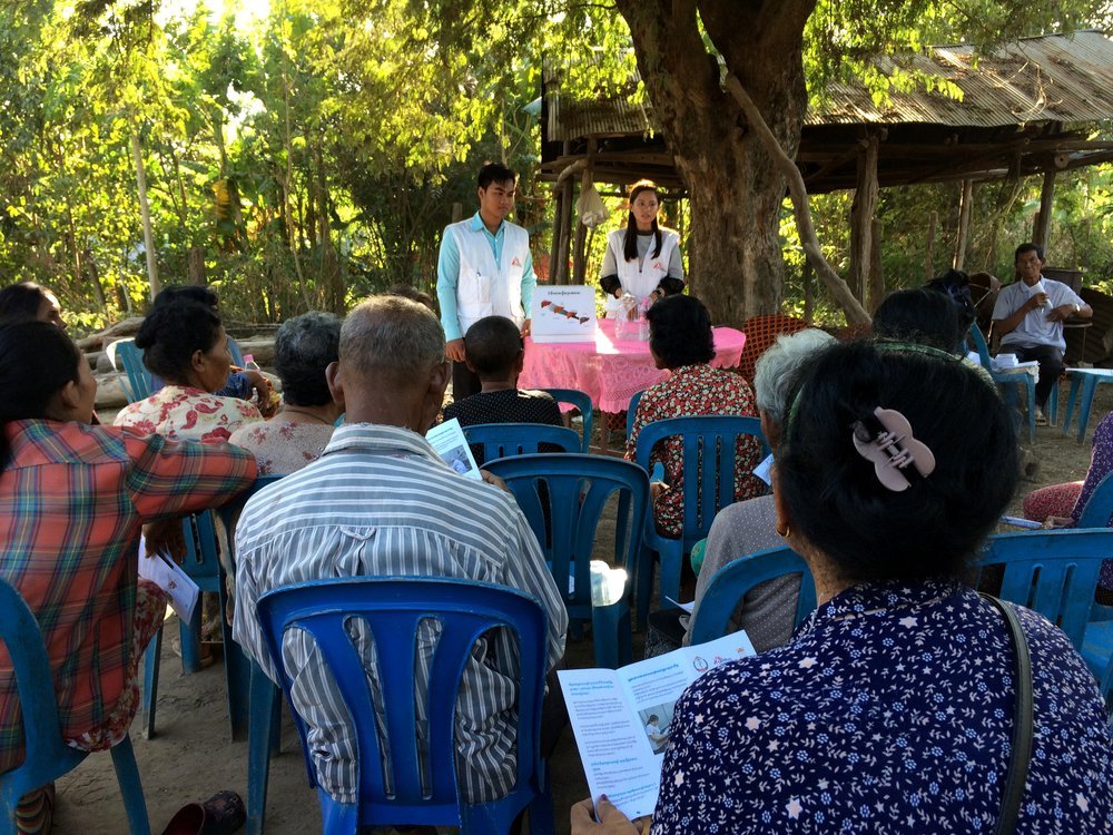 Sol Rasy, nurse supervisor, explains the means of transmission of Hepatitis C and the course of the disease to villagers in Muang Roussei district in Cambodia. 2019. 