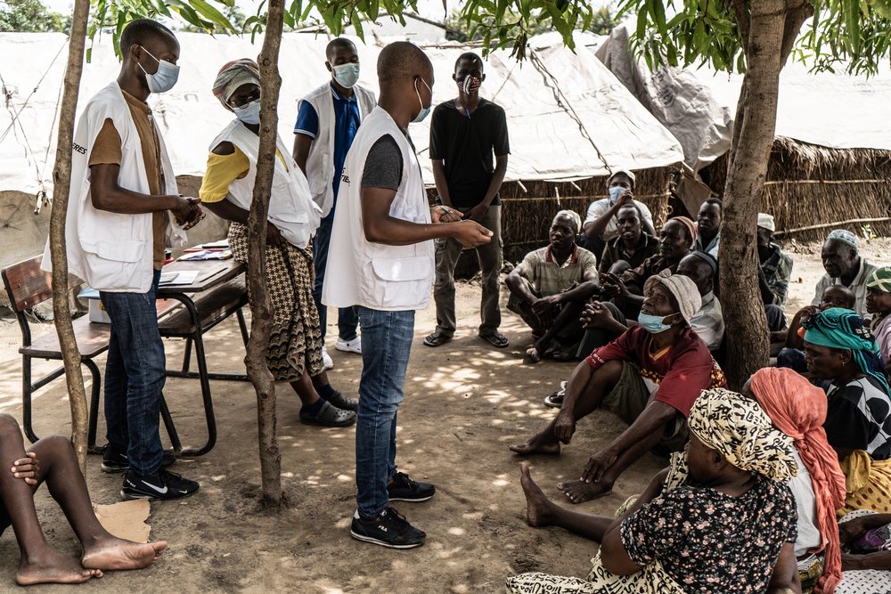 A mental health session is conducted with people who have sought shelter in the Nangua camp for internally displaced people. These sessions are used to help those displaced by the armed conflict in Cabo Delgado get support for issues like PTSD.