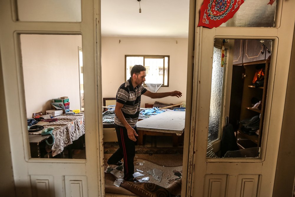 Palestinian man stands inside destroyed apartment in Gaza city. 11 days of Israel’s intense aerial and ground bombardments has caused a huge impact on people’s lives in Gaza.