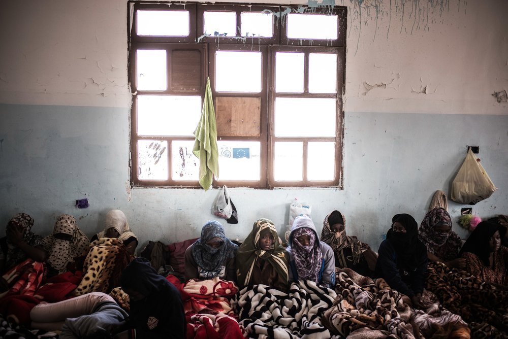 Women detained at female-only Sorman detention centre, around 60km west of Tripoli, Libya. Detainees receive irregular rations that are distributed once or twice day if not at all. 2017.