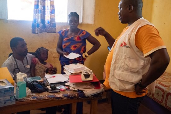 A medical consultation is ongoing in the MSF-supported Bondeko Health Center of Ndu, northern DRC, where thousands of people from the CAR sought refuge. 