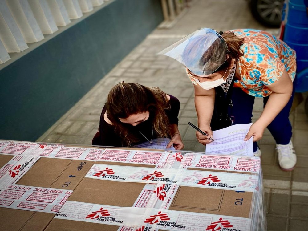  MSF staff checking the drugs and equipment they received to support the recently launched COVID-19 intervention in Huaura province, Peru. Local capacity for medical treatment and oxygen therapy is dramatically insufficient to meet the needs.