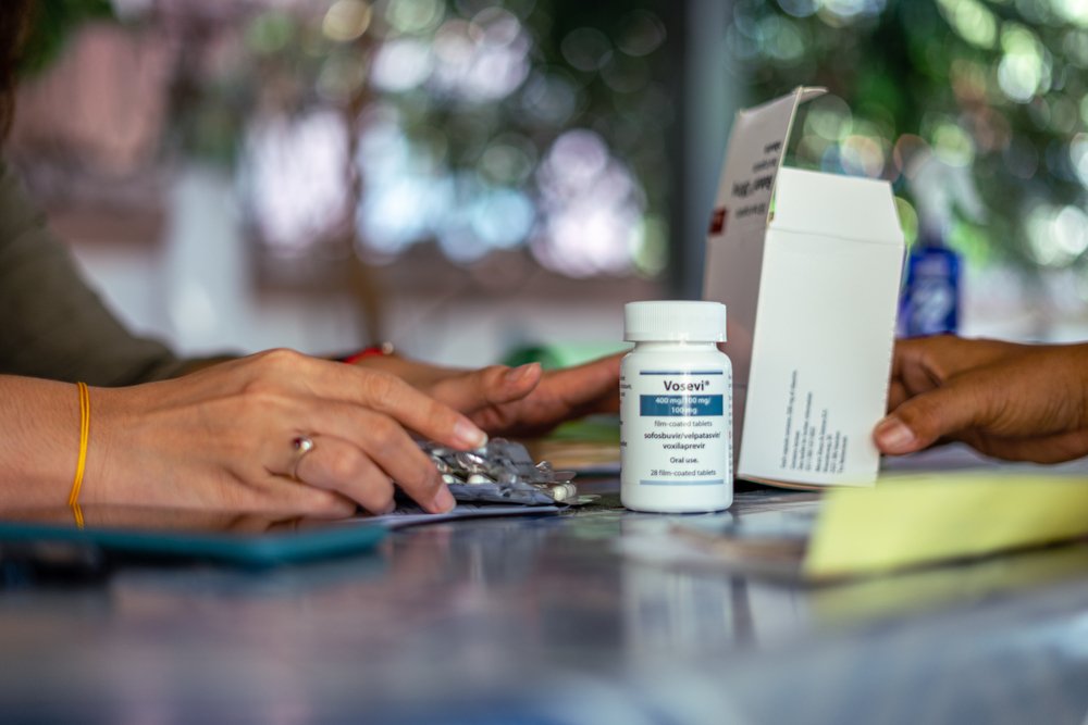 An MSF staff member prepares medication for a patient in Yangon&#039;s MSF offices.