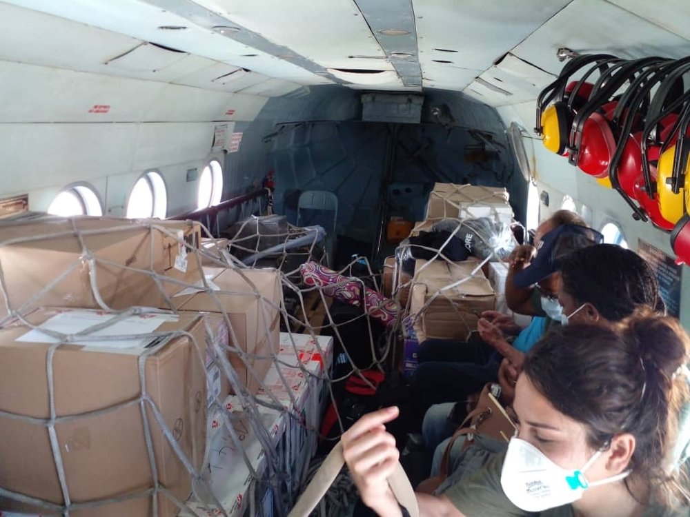 An MSF emergency team travels from Port-au-Prince to Grand Anse in helicopter with medical and humanitarian supplies.