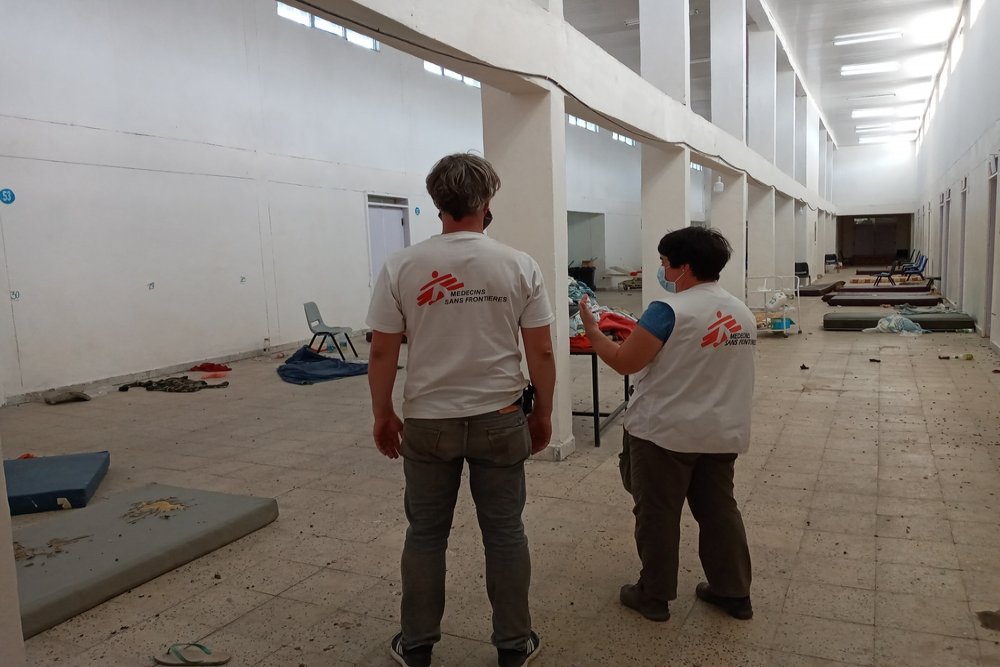 Two MSF staff inspect a room that will be converted into a hospital ward in Adigrat, in Tigray, northern Ethiopia.