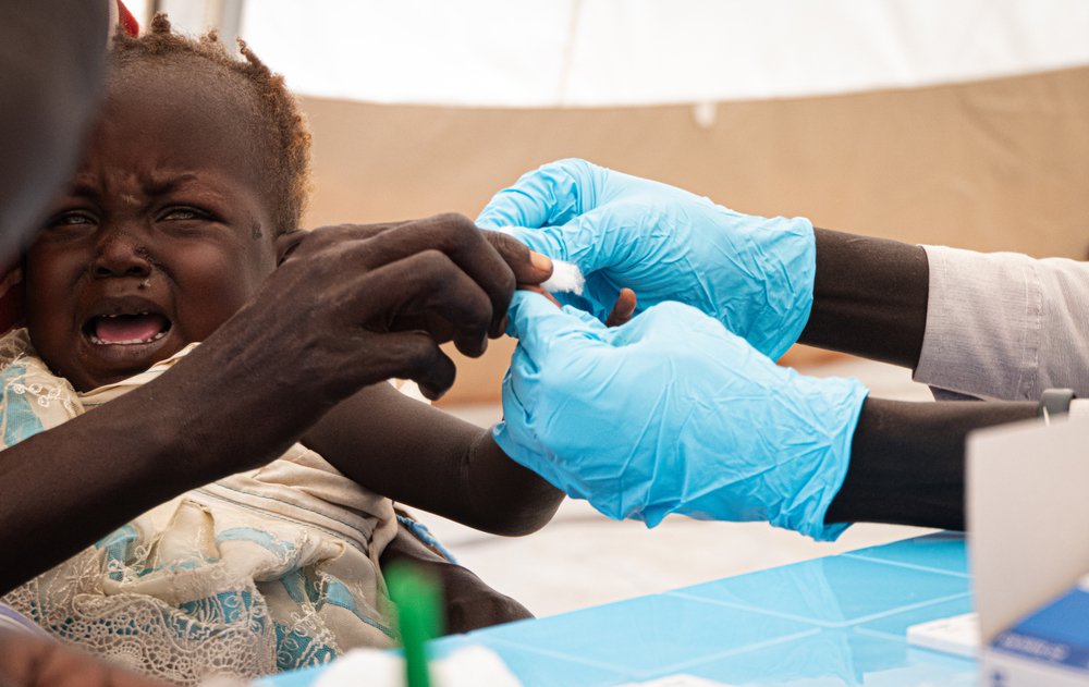 A baby is tested for malaria by the MSF medical team in a mobile clinic in Bentiu town, Unity state.