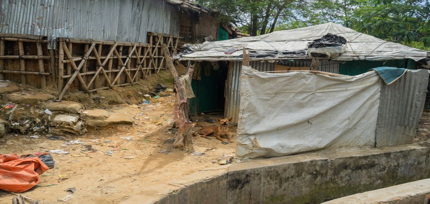 A makeshift shelter made from bamboo and tarp at Kutapalong refugee camp at Cox’s Bazar district, Bangladesh. The temporary shelters, occupied by Rohingya refugees who fled the atrocities in Myanmar, are small and cramped closely together. (June, 2022).