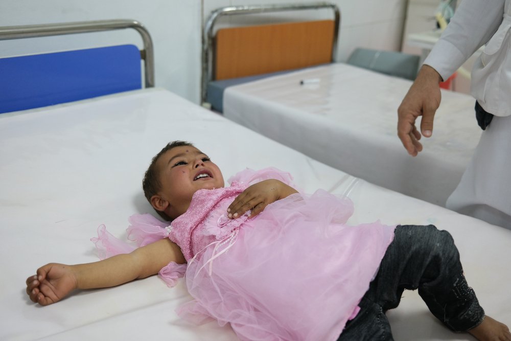 Samira, pictured in Boost hospital’s emergency room, has been unwell since catching measles two months ago. (February, 2022).
