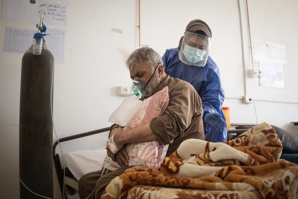 A patient receives care in the COVID-19 ward of Raqqa National Hospital, in northeast Syria. (June, 2021).