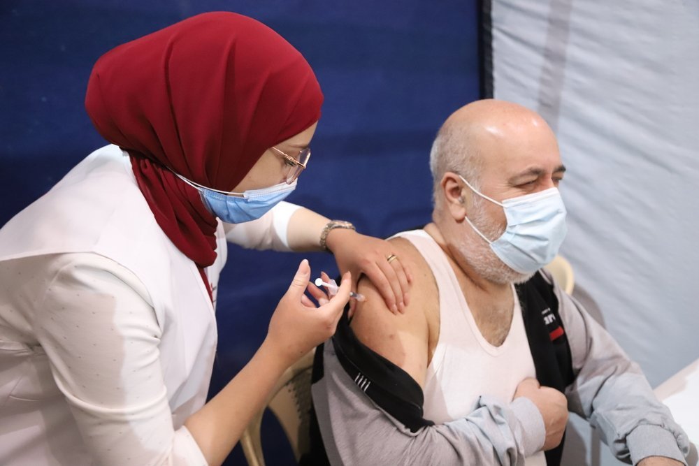 A man receives a dose of COVID-19 vaccine at the MSF vaccination center in Bar Elias (Bekaa Valley).