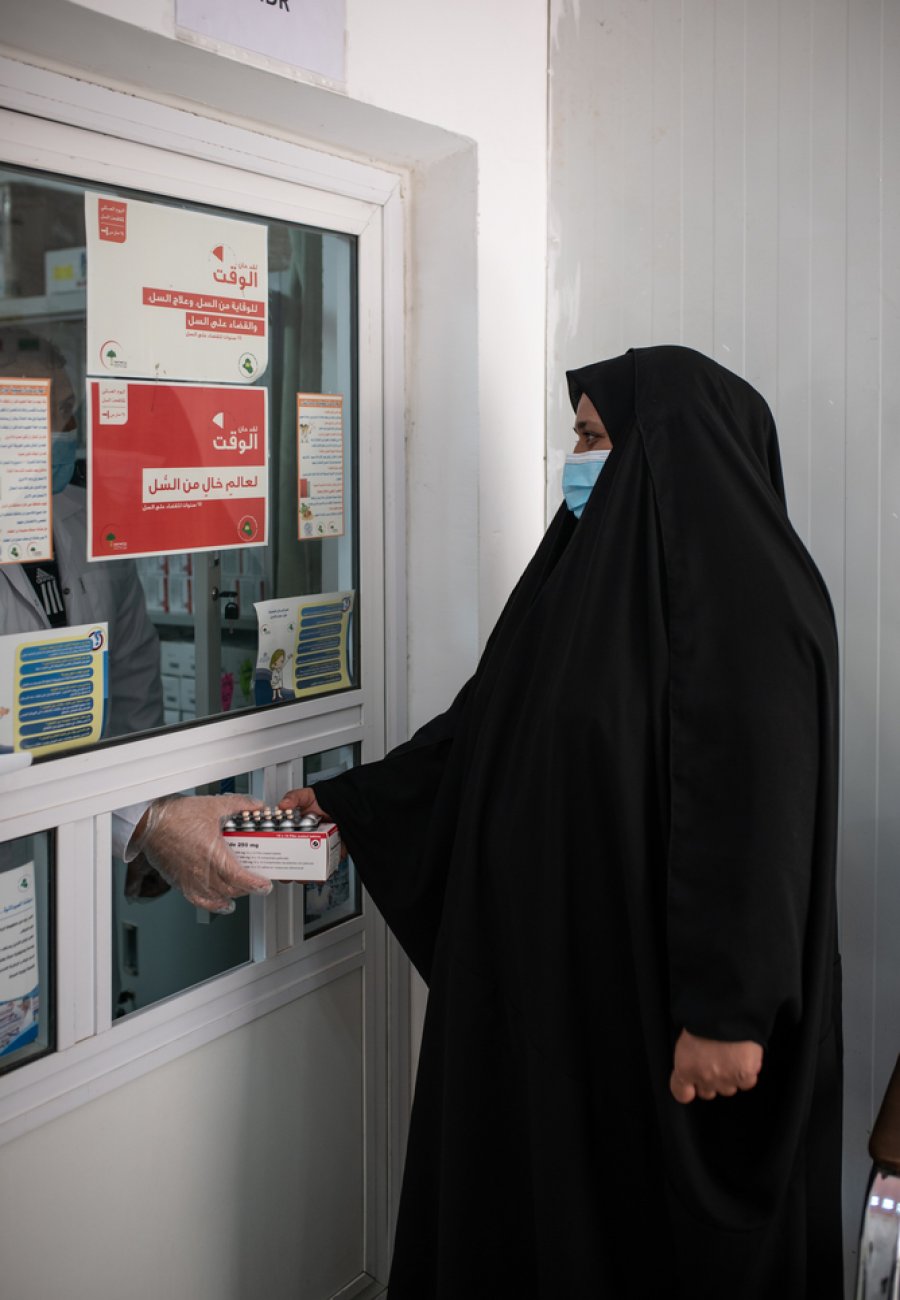 Fatin receives medications for her treatment for MDR-TB. She started with 8 pills a day for two months and now takes 3 pills a day, with nine months to go before being considered fully cured. National Tuberculosis Institute, Baghdad Medical City, Baghdad.
