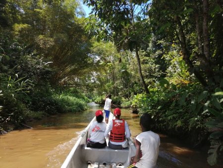 MSF outreach travels by canoe in a small river in Nariño, en route to a community where medical services rarely penetrate.