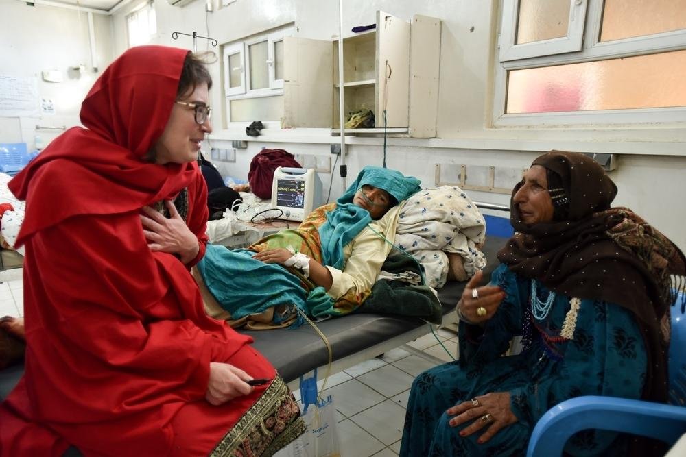 An MSF obstetrician/gynaecologist speaks with a mother and her daughter in Khost maternity hospital. The daughter is recovering from a post-partum haemorrhage after giving birth at home.